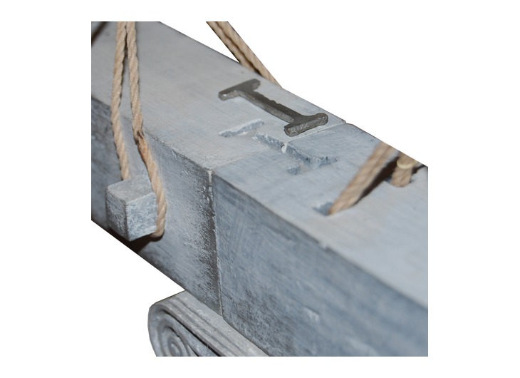 Model of metal clamps joining adjacent stone blocks