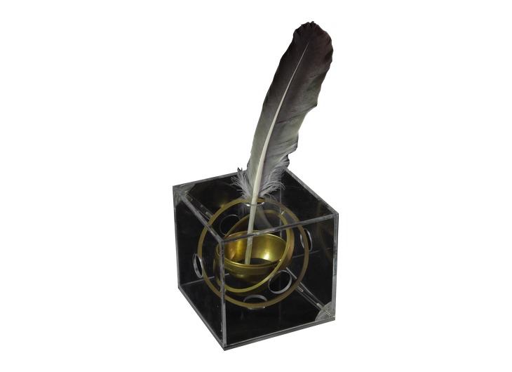 Reconstructed gimbal inkwell of Philon with concentric rings and a feather pen