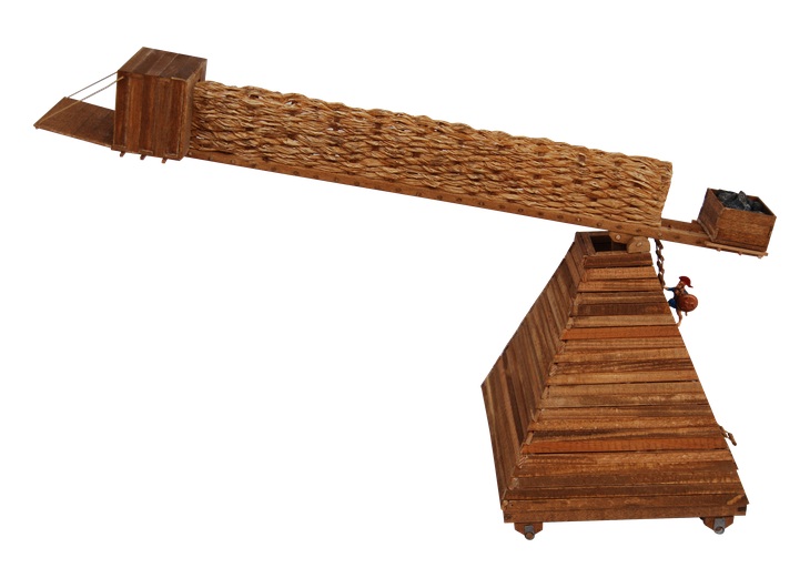 Reconstructed sambyke siege ladder of Damios extended horizontally with a protected assault platform
