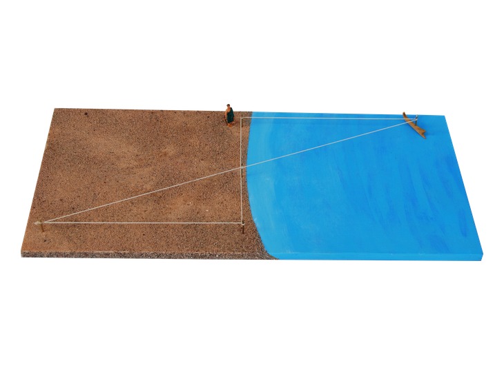 Model demonstrating a ship’s distance from the shore with equal triangles